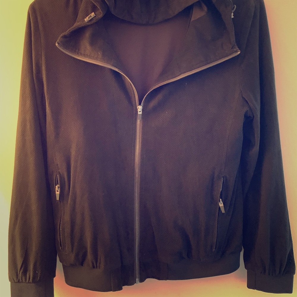 Black zip up jacket.